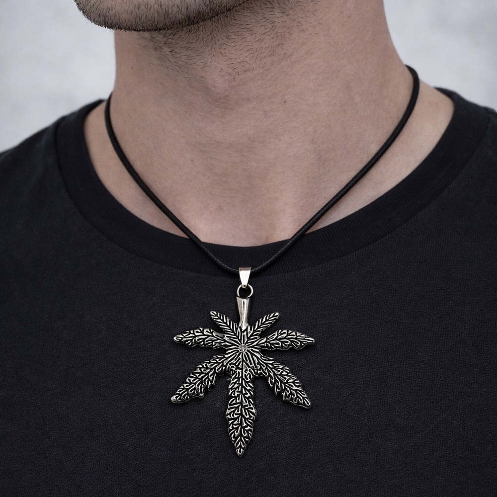 NWOT Pot leaf pendant with solitaire stone and wax cord